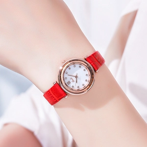 Elegant women's quartz watch with red leather strap and sparkling crystal markers