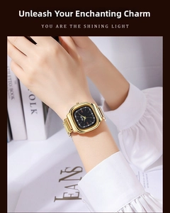 Close-up of a luxury square gold stainless steel watch with black dial on a wrist