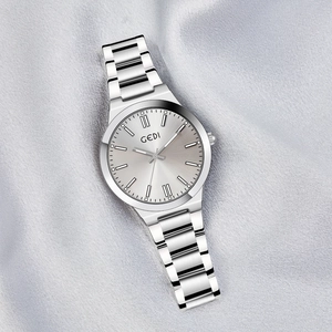 Minimalist silver steel women's quartz watch with sleek textured dial and metal strap