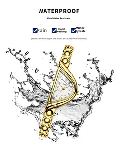 Detailed view of gold luxury watch with waterproof splash and unique X-link bracelet