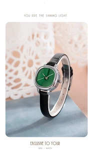 Close-up of GEDI vintage square green watch dial with silver case on a textured stone surface
