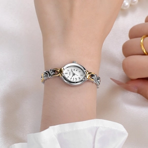 Montre à quartz ovale GEDI pour femmes avec bracelet chaîne bicolore or et argentée