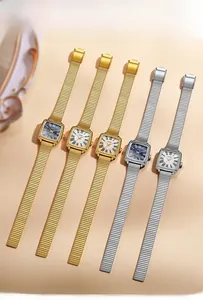 Detail view of square dial quartz watches with Roman numerals and metal mesh straps