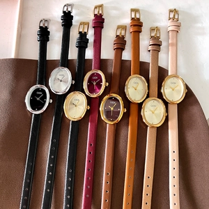 Collection of vintage oval quartz watches for women with minimalist leather straps