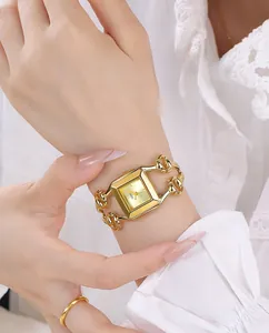 Detail of gold square quartz watch for women with 30m water resistance and chain link strap