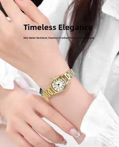 Detail view of gold tonneau watch for women featuring 30M water resistance