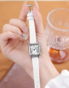 Classic square watch with white crocodile leather strap and blue hands detail