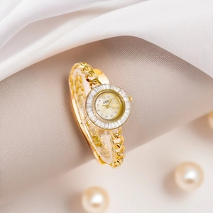 Montre Femme Quartz Luxe Or Alliage Bracelet Cadran Nacre Strass Baguette Rétro Mode Bijoux Montre Bracelet