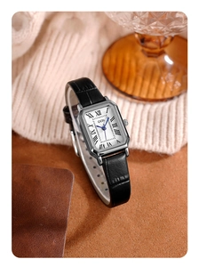 Elegant vintage square silver watch with Roman numerals on a black leather strap