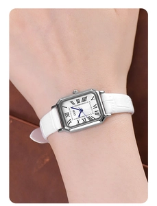 Classic silver rectangular quartz watch with white crocodile pattern leather strap on wrist