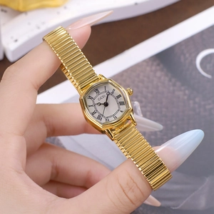 Elegant gold tonneau watch with Roman numerals on a slim stretch band for women