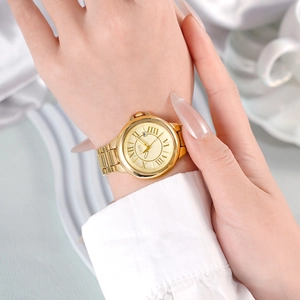 Luxury gold women's watch with Roman numeral dial and date window on a steel strap