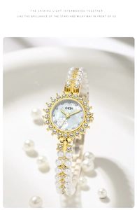Detail of GEDI luxury watch featuring a rose pattern dial and pearl bracelet band