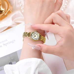Elegant GEDI tonneau gold quartz watch for women with Roman numerals and metal strap