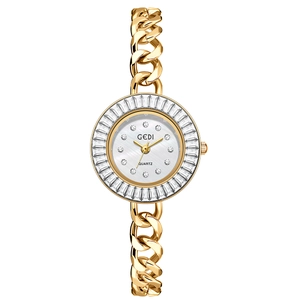 Montre GEDI dorée de luxe avec cadran en nacre et lunette sertie de cristaux
