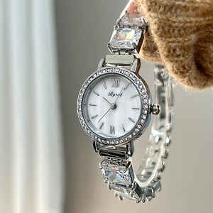 Silver quartz watch for women with mother of pearl dial and square zircon bracelet