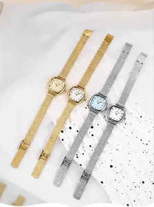 Selection of elegant square women's quartz watches with metallic mesh straps in gold and silver