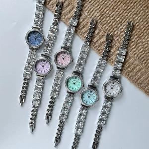 Elegant ladies quartz watches with mother-of-pearl dial and diamond-set bracelet band