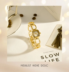 Detail of GEDI gold square watch with unique hollow link bracelet on lifestyle background