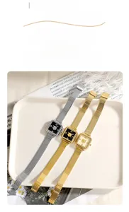 Close-up of square quartz watches with clover patterns and metallic stretch bands