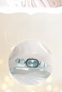 Detail view of oval silver watch with light blue dial and semi-precious stone strap