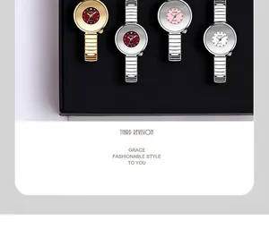 Close-up of elegant GEDI quartz watches with colorful minimalist dials in a black jewelry box