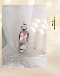 Detail of Gedi silver bracelet watch with pink oval dial and irregular geometric link strap