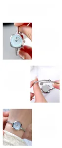 Dettaglio dell'orologio GEDI con quadrante cigno e cinturino a treccia in acciaio inox