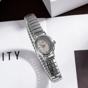 GEDI elegant silver oval watch for women with stretch metal strap and minimalist dial