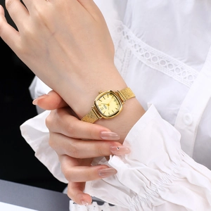 Elegant gold square quartz watch for women with vintage metal mesh strap on wrist