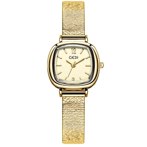 Elegant gold quartz watch for women with vintage cushion case and textured steel strap