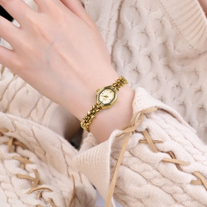 Elegant gold vintage bracelet watch for women with a unique hexagonal geometric dial