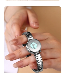 Close-up of GEDI women quartz watch with mint green dial and silver elastic band