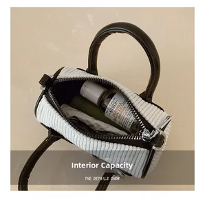 Interior view of mini corduroy bucket bag showing storage capacity for small essentials