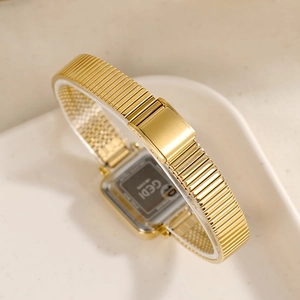 Elegant GEDI women's gold square watch featuring a textured metal band and vintage aesthetic