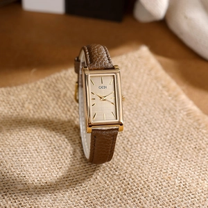 Elegant vintage rectangular women quartz watch with deep brown leather strap and gold dial