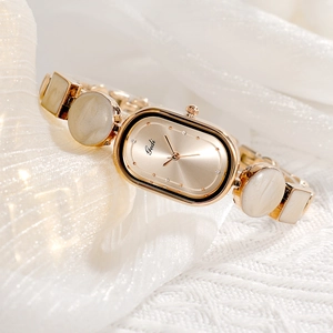 Elegant Gedi oval rose gold watch for women featuring marble textured resin strap links