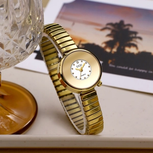 Elegant gold minimalist women's quartz watch with a unique elastic metallic band