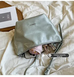 Detailed view of the spacious interior of this silver leather hobo bag for daily essentials