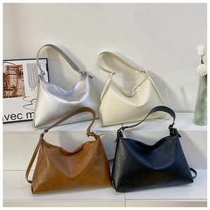 Four minimalist Hobo shoulder bags in silver, beige, brown, and black colors
