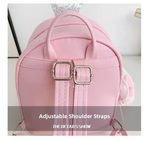 Detail showing adjustable leather straps and silver metal buckles on pink kids backpack