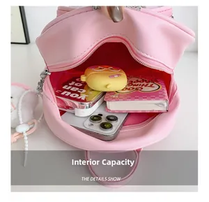 Internal view showing storage capacity for phone, earphones and mini notepad