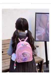 Pink cartoon girl backpack with shiny sequins and a crown detail shown from the back