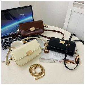 Three minimalist PU leather shoulder bags with gold buckles shown from a top-down view