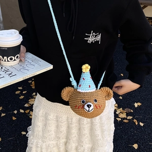 Handmade crochet bear crossbody bag for children with cute party hat and knit texture