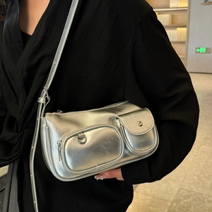 Chic silver metallic underarm bag with multi-pocket design and adjustable shoulder strap