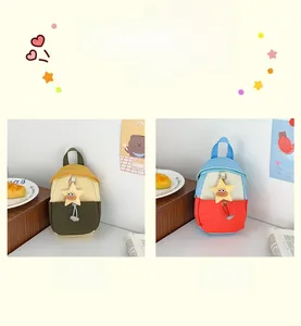 Mini canvas messenger bags for kids featuring star charms in green and blue colors