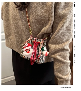 Mini Christmas bucket bag with red and green plaid pattern and Santa plush detail