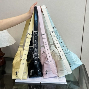 Fashionable PU leather crossbody bags with grommet straps in five macaron colors