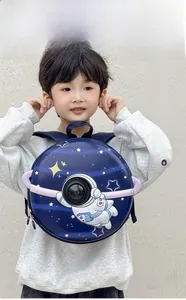 Close-up of a hard shell astronaut kids backpack with waterproof space pattern design